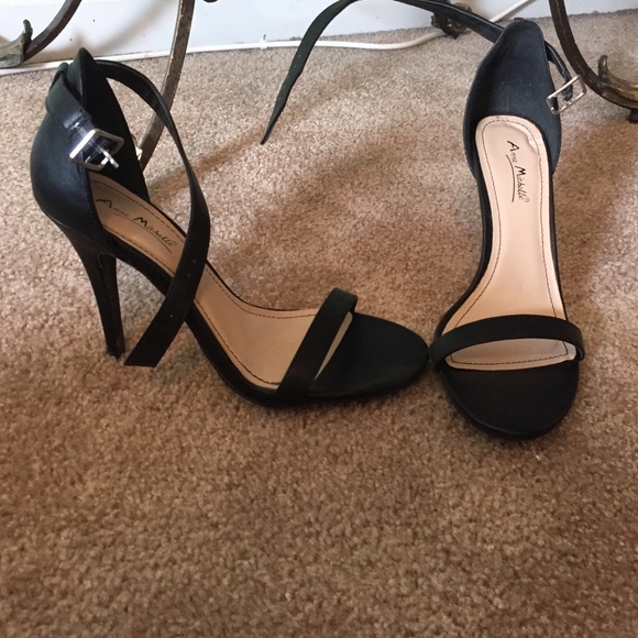 Black thin strap open toe high heel shoe