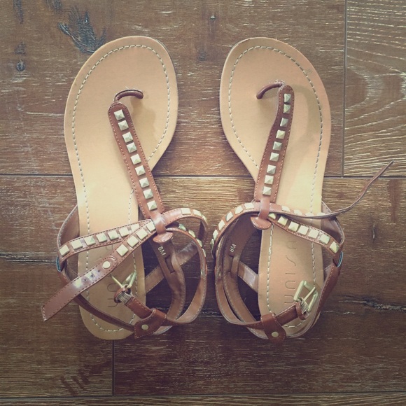 Size 8 brown sandals with gold embellishments