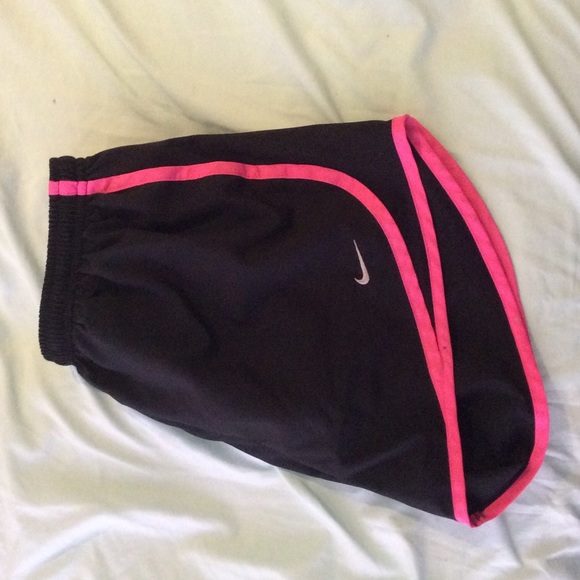 Pink and black Nike dri fit running shorts