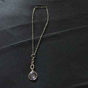 Necklace with pink stone