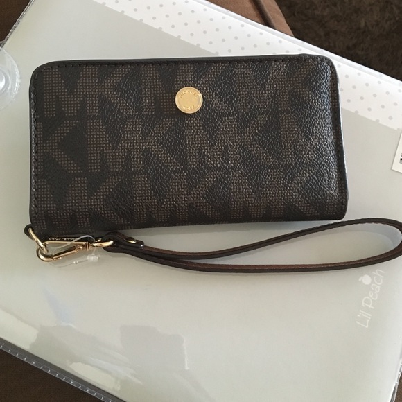 Michael Kors brown monogram tech wallet