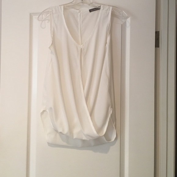 White sleeveless shell top