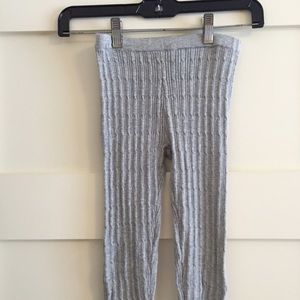 Three pairs of leggings.