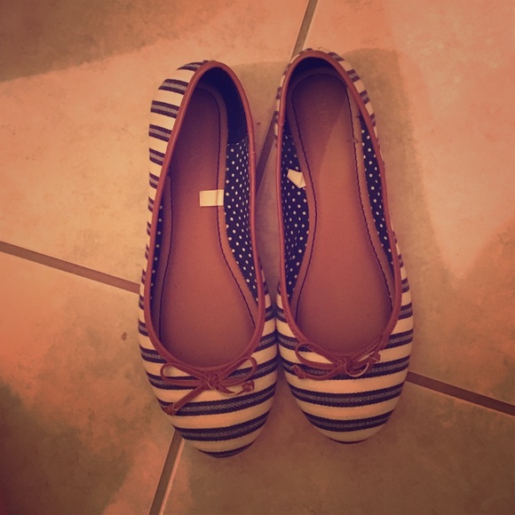 Navy and white flats.