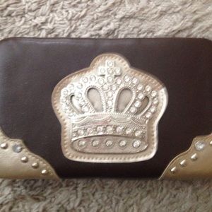 Brown hard wallet with crown embellishment
