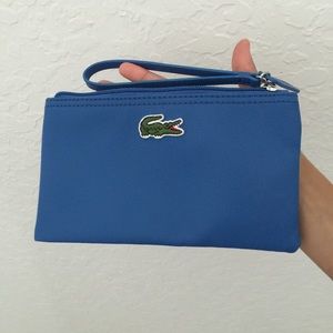 Blue Lacoste Wristlet