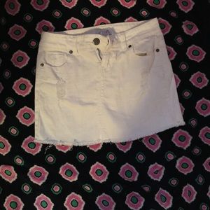 Distressed white jean skirt