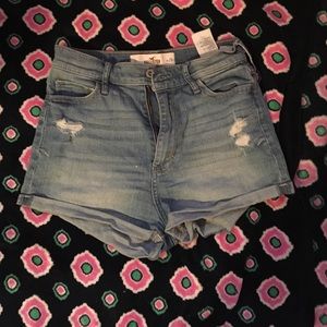 Distressed natural waist jean shorts
