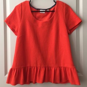 Anthropologie orange peplum top