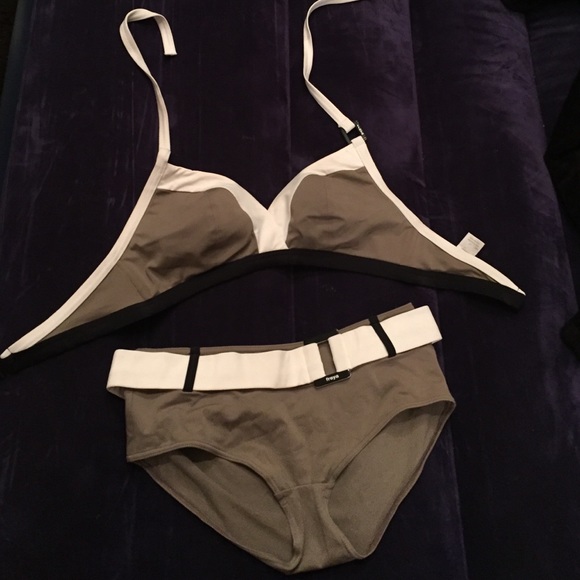 Tope and white two piece bathing suit