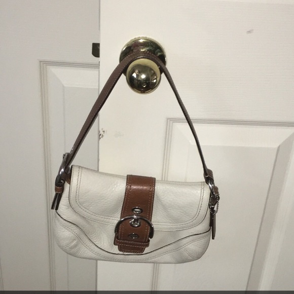 Timeless bone and brown Coach purse!