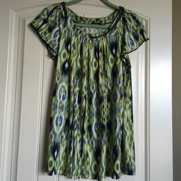 Raglan sleeve multicolored knit top.