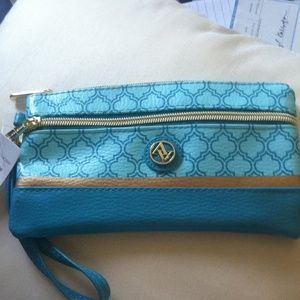 Blue and gold Adrienne vittadini wristlet