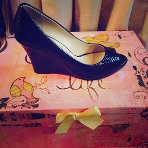 Sought After Black Peep Toe Cole Haan Wedge