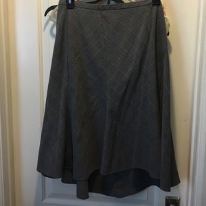 Plaid calf length skirt.