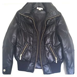 VS Black puffer jacket.