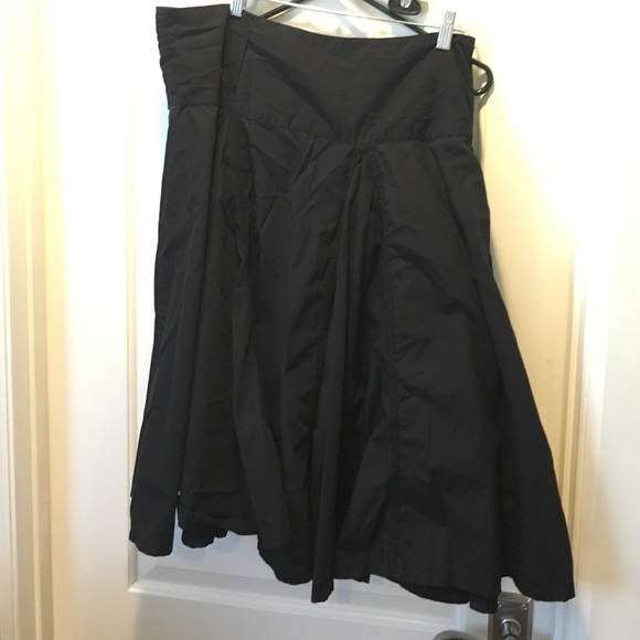 Black flouncy skirt.
