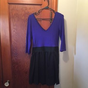 Long sleeve form fitting dress.