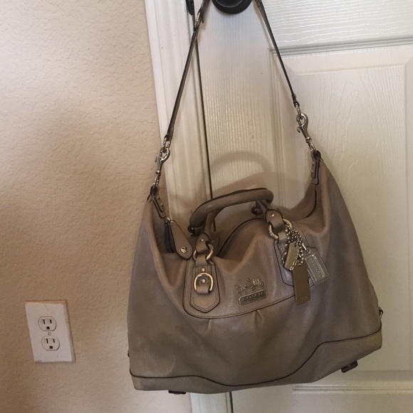 Coach- satchel grey with charms.