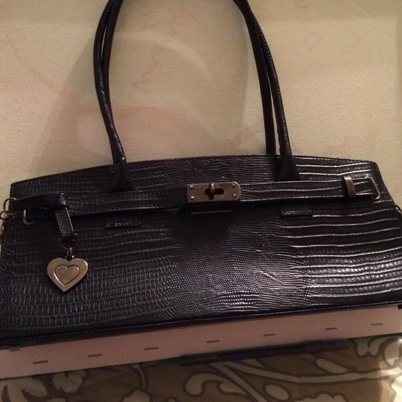 Stuart Weitzman lizard handbag.