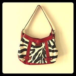 Cute Rosetti zebra and red purse