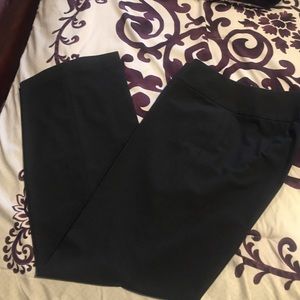 Wide band, grey dress slacks.