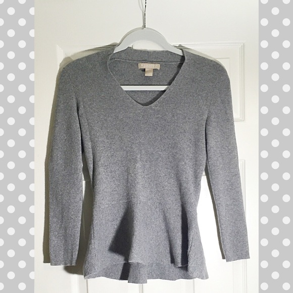 Italian wool gray peplum sweater.