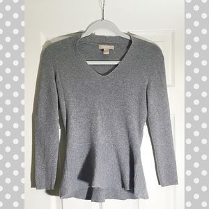 Italian wool gray peplum sweater.