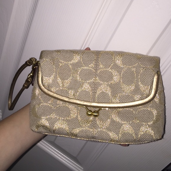 Gold Coach wristlet in excellent condition