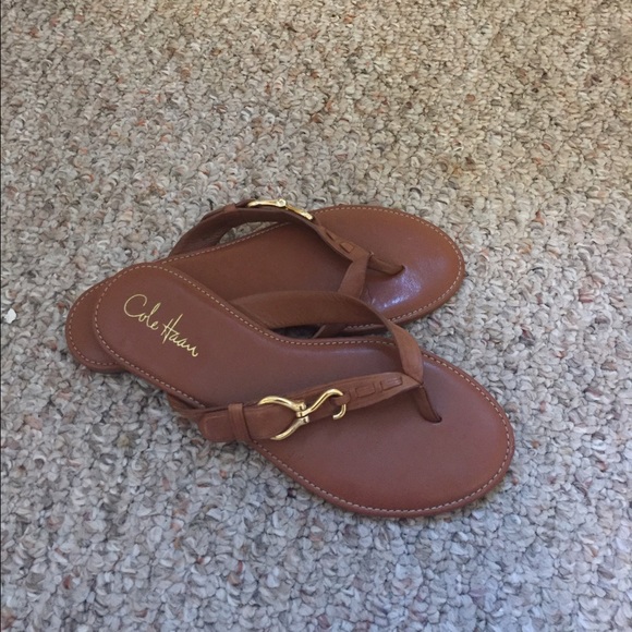 Tan leather sandals by Cole Haan.