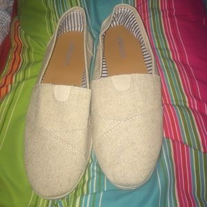 Ivory slip on shoes
