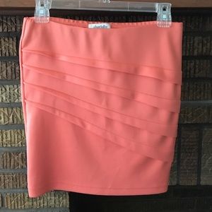 Salmon pink mini skirt