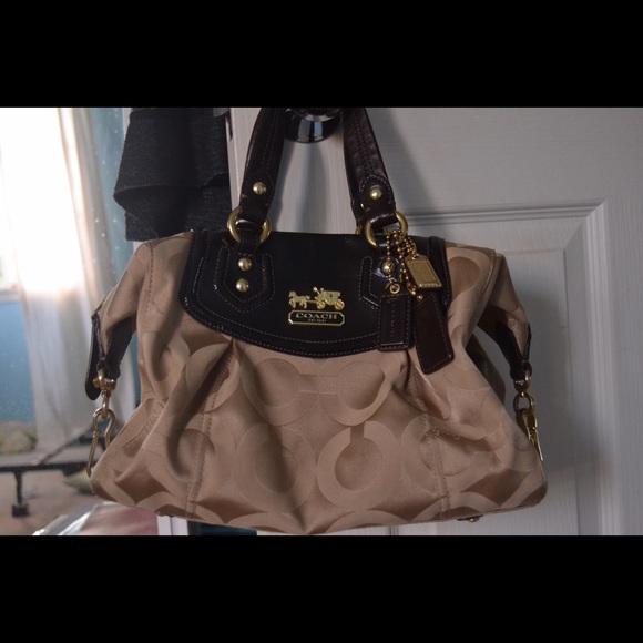Coach Handbags - Coach handbag in khaki/tan print. Gently used.