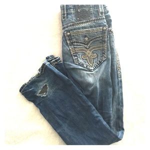 Size 27 well loved jeans,sequins on backer pocket.