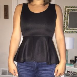 GREAT CONDITION black peplum top! Cute bow on back
