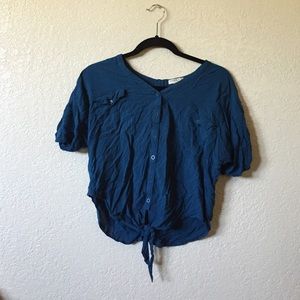 button on blouse. size small. guc.