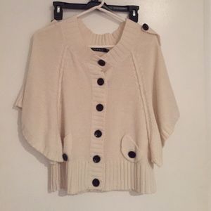 Cream colored short sleeve sweater