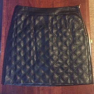 Quilted faux leather mini skirt