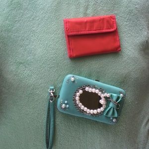 1 phone wallet and one pocket wallet