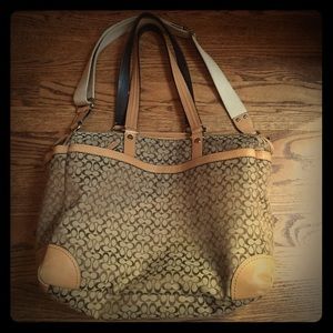 Coach brown signature cross body bag.