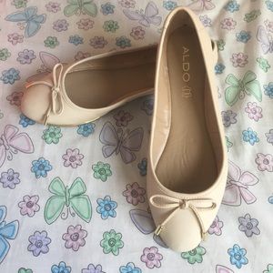 Cream with gold lining flats