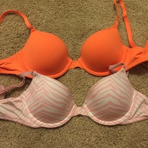 2 pink bras