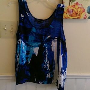 Attention sheer sleeveless top.