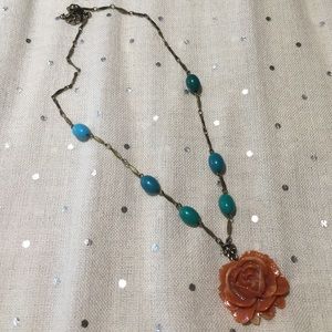 Necklace with blue beads and coral 3D flower