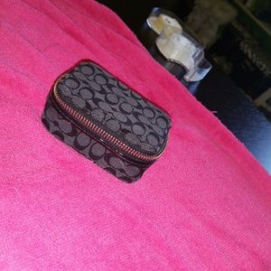 Coach pill case