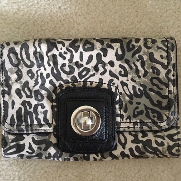 Grace Adele Ocelot leather clutch