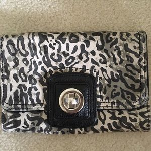 Grace Adele Ocelot leather clutch