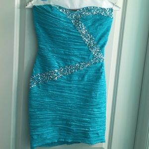 Nice, strapless turquoise dress with sequins