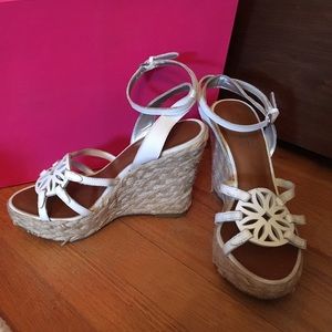 White wedge sandals. 4" high with ankle strap.