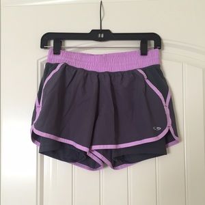 purple and grey running shorts